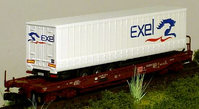 1208 Taschenwagen-Pritschenauflieger EXEL weiss Internet