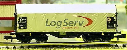 1393 ROCO Schiebeplanen-Wagen LogServ altweiss
