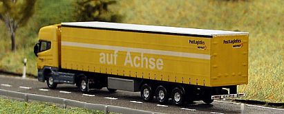 1559 HERPA SCANIA Gardinenplanen-Sattelzug - Swiss Post  - Zugmaschine Nr 152 - hinten - Landschaft - Internet