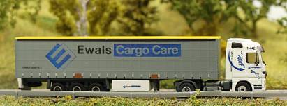 1920 Gardinenplanen - Sattelzug (Basismodell HERPA) - Ewals Cargo Care - rechts - Internet 1920 Gardinenplanen - Sattelzug (Basismodell HERPA) - Ewals Cargo Care - rechts - Internet